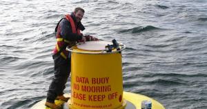 Dr Adam Mellor (AFBI) on a research buoy Dr Adam Mellor (AFBI) on a research buoy