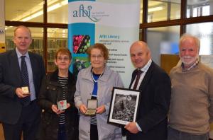 John Clarke’s daughter, Miriam Hanna and niece, Rosemary McGarry, bring material for an exhibit to celebrate his achievements in potato breeding in Northern Ireland. John Clarke’s daughter, Miriam Hanna and niece, Rosemary McGarry, bring material for an exhibit to celebrate his achievements in potato breeding in Northern Ireland.