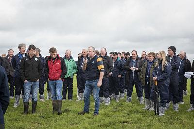 Harold Johnston with his sons Jack and Steven speaking at the GrassCheck Dairy Farm Walk on his farm Harold Johnston with his sons Jack and Steven speaking at the GrassCheck Dairy Farm Walk on his farm