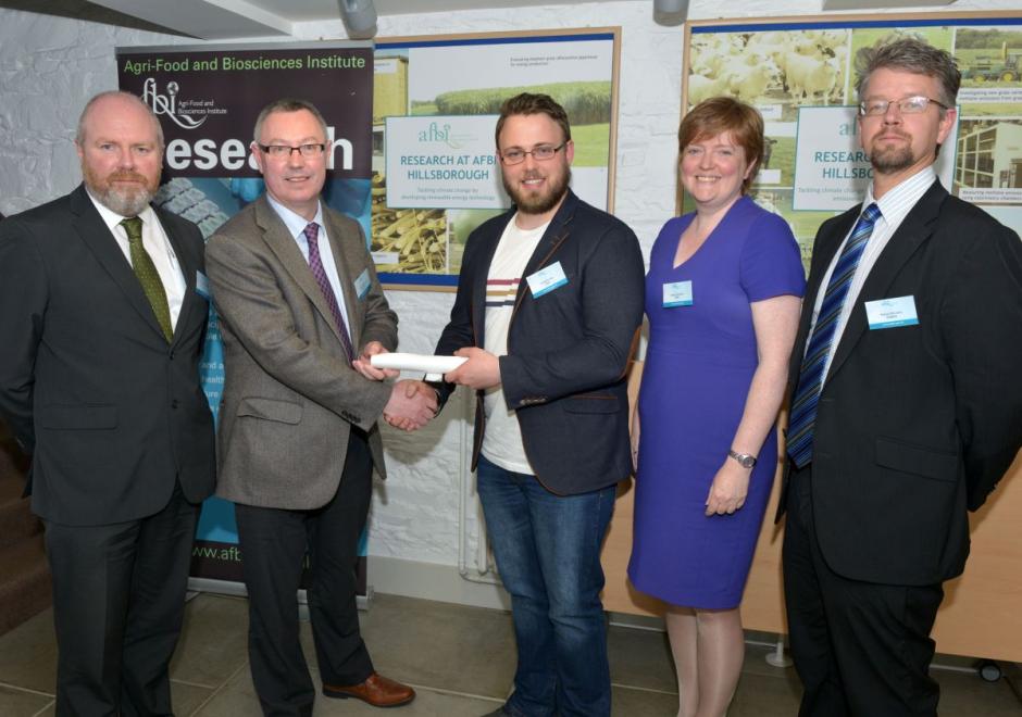 Donal Griffin receiving his prize for best presentation from Dr Stanley McDowell, AFBI DCEO Donal Griffin receiving his prize for best presentation from Dr Stanley McDowell, AFBI DCEO