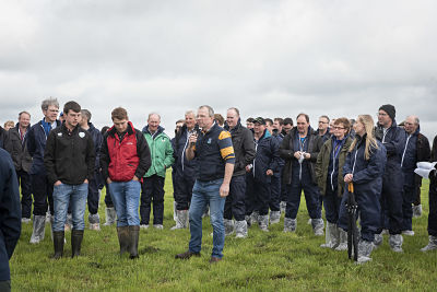 Harold Johnston with his sons Jack and Steven speaking at the GrassCheck Dairy Farm Walk on his farm Harold Johnston with his sons Jack and Steven speaking at the GrassCheck Dairy Farm Walk on his farm