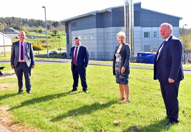 DAERA Minister Edwin Poots, Department of Health Minister Robin Swann pictured with Josephine Kelly, AFBI Director and Alastair Douglas, Head of AFBI Veterinary Sciences Division