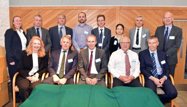 The panel of industry representatives who took part in the discussion at the seminar pictured with the report authors back row at the seminar pictured with the report authors back row, 2nd from right Professor John Davis, Dr Siyi Feng and Dr Myles Patton.