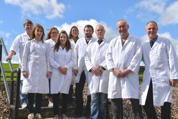 Dr John Archer with his staff from the AFBI Hillsborough Laboratory