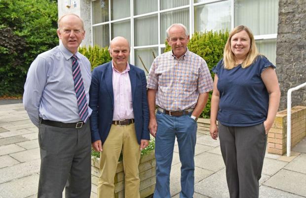 Pictured (L-R) Sinclair Mayne (AFBI CEO), Jim McAdam (Head of Grassland and Plant Sciences Branch), David Johnston and Gillian Young (Grass Breeder, AFBI Loughgall).