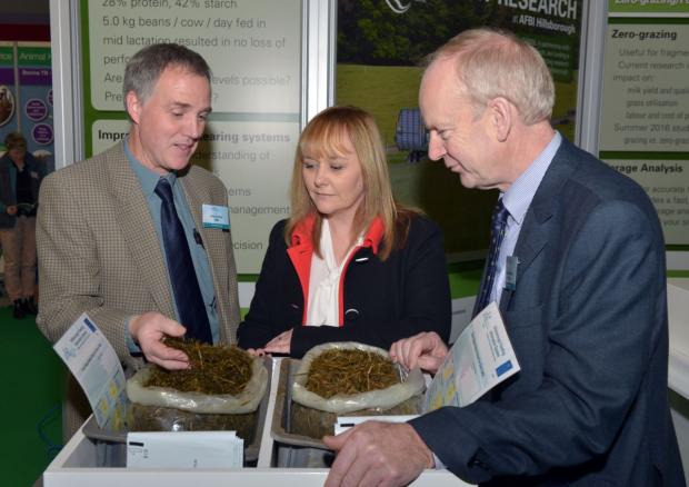 Dr John Archer pictured with DAERA Minister Michelle McIlveen and AFBI CEO Dr Sinclair Mayne