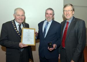 L-R Royal Agricultural Society President, Billy Robson presented Dessie Irwin with his Long Service award to the industry, with Head of AFBI Hillsborough, Prof Trevor Gilliland