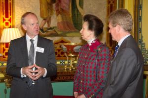 Dr Mayne with HRH Princess Anne and Professor David Leaver in Buckingham Palace following the presentation