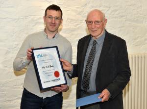 Dr Ramon Muns (Head of the AFBI Monogastric Research Group) presenting a commemorative certificate to Professor Fred Gordon