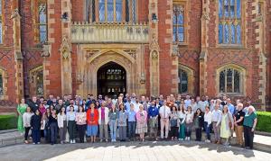 Delegates, organisers and speakers at the IPSAM 2023 outside Queen’s University Belfast on Day one of the Conference
