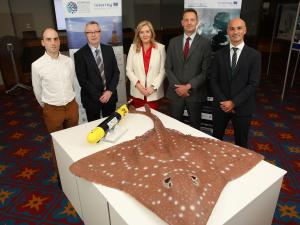 Pictured are (from l-r): Tom Evans (Marine Scotland Science), Stanley McDowell (AFBI CEO), Gina McIntyre (CEO, SEUPB), Oliver O’Cadhla (Dept of Housing, Local Gov & Heritage) and Colin Armstrong (Marine & Fisheries Division, DAERA)