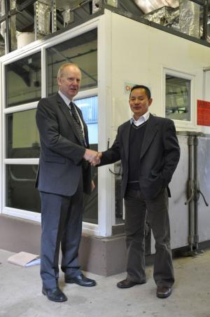Dr Sinclair Mayne congratulates Dr Yan on securing AFBI involvement in an important global research project.