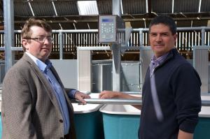 Conrad Ferris (AFBI), pictured right and Jason Rankin (AgriSearch) discuss the new individual cow feed intake and feeding behaviour monitoring equipment that will be used in the precision feeding studies at AFBI, Hillsborough